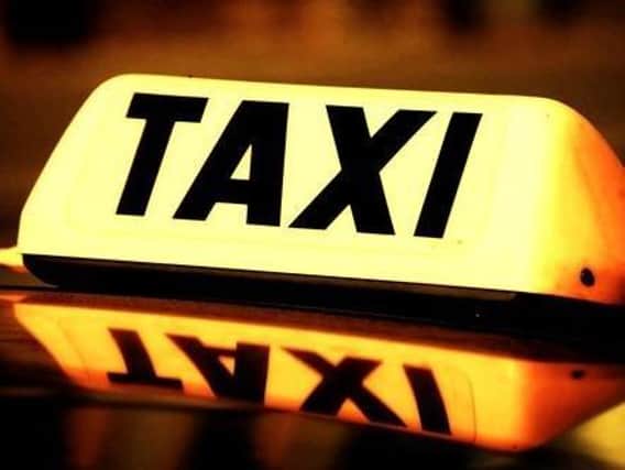 Magnetic signs will be trialled on some Portsmouth taxis from November