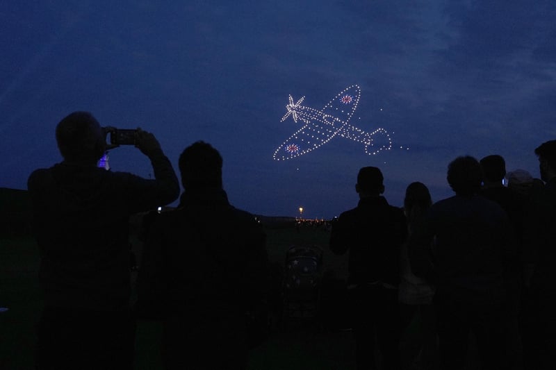 Drones make a Spitfire during a drone display telling the story of D-Day . Photo: Andrew Matthews/PA Wire
