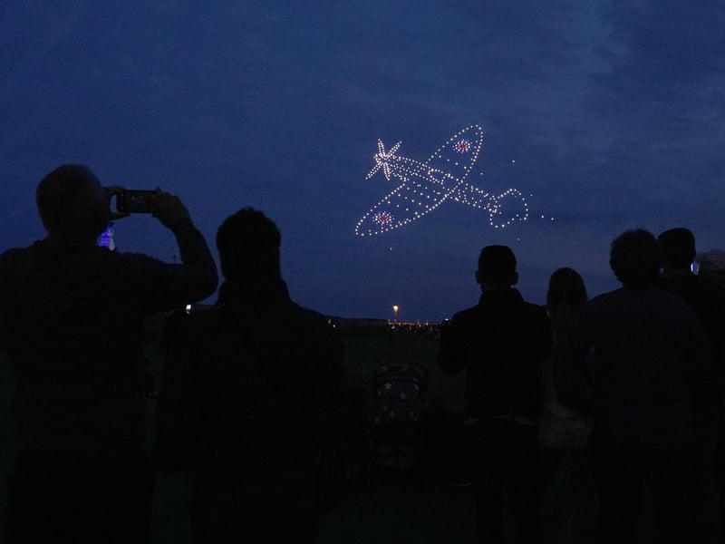 Drones make a Spitfire during a drone display telling the story of D-Day . Photo: Andrew Matthews/PA Wire