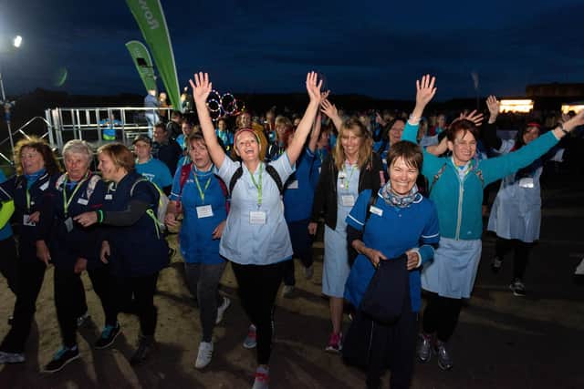 Moonlit Memories Walk 2019 for Rowans Hospice along the Seafront and Old Portsmouth -  The Doctors and Nurses of Rowans Hospice led off the walk.  Picture: Vernon Nash (150619-022)
