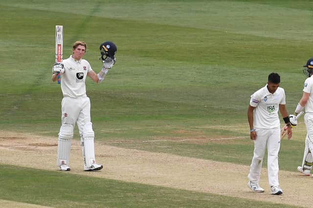 Zak Crawley  celebrates reaching his century against Hampshire at Canterbury. Photo by Alex Davidson/Getty Images.