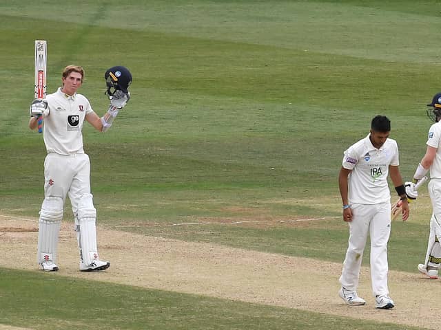 Zak Crawley  celebrates reaching his century against Hampshire at Canterbury. Photo by Alex Davidson/Getty Images.