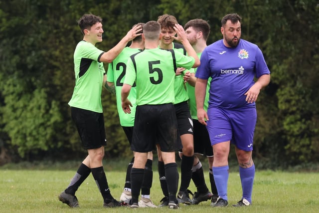 AFC Bedhampton Village reserves celebrate scoring during their meeting with Friends Fighting Cancer in City of Portsmouth Sunday League Division Four. Picture: Kevin Shipp