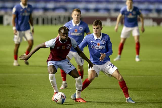 Harry Kavanagh, right, on his Pompey debut in the EFL Trophy against West Ham U23s last November. Photo by Robin Jones/Getty Images.