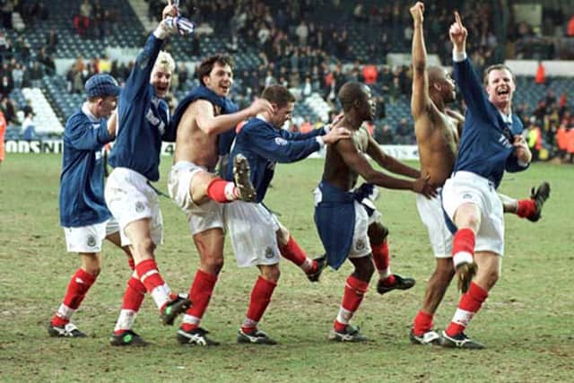 Mathias Svensson (second from left) and his Pompey team-mates do the conga on the Elland Road pitch following their 3-2 FA Cup success at Leeds in February 1997