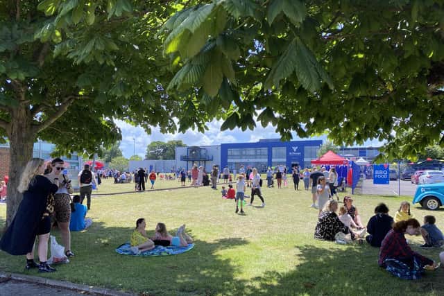 Families relaxing in the sunshine at St Vincent College’s Summer Fest 2022