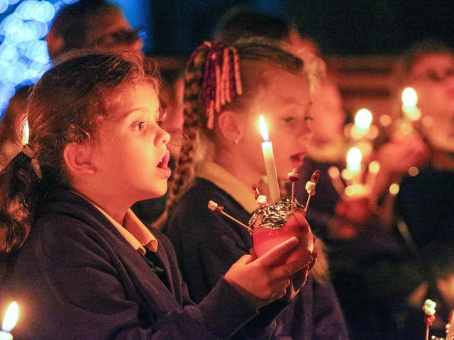 School choir with Christingles. The News Carol Service, St Mary's Church, Fratton, PortsmouthPicture: Chris Moorhouse (jpns 081223-67)
