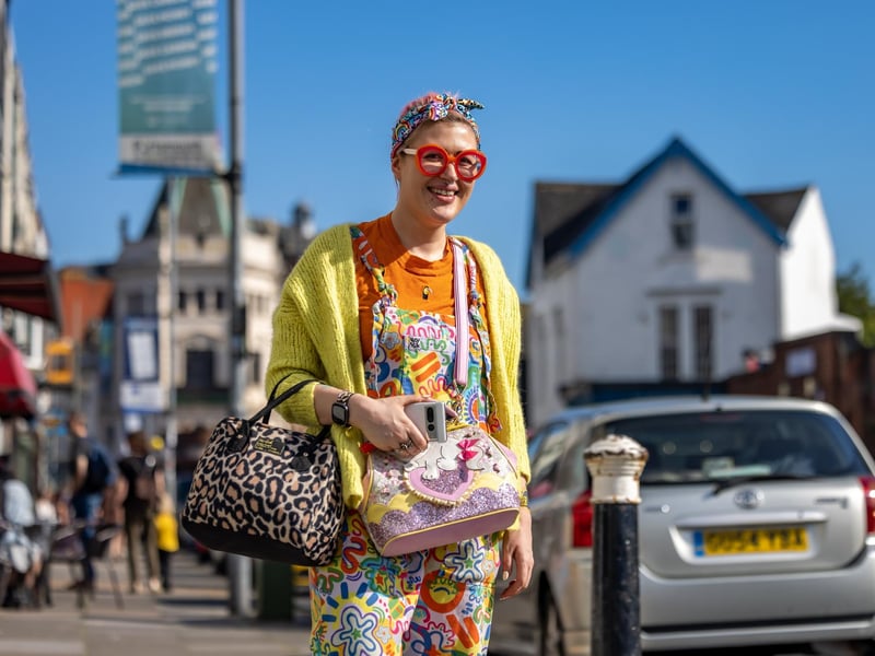 Jo Gabriel (30) bringing a splash of summer colour to Albert Road. Picture: Mike Cooter (110524)