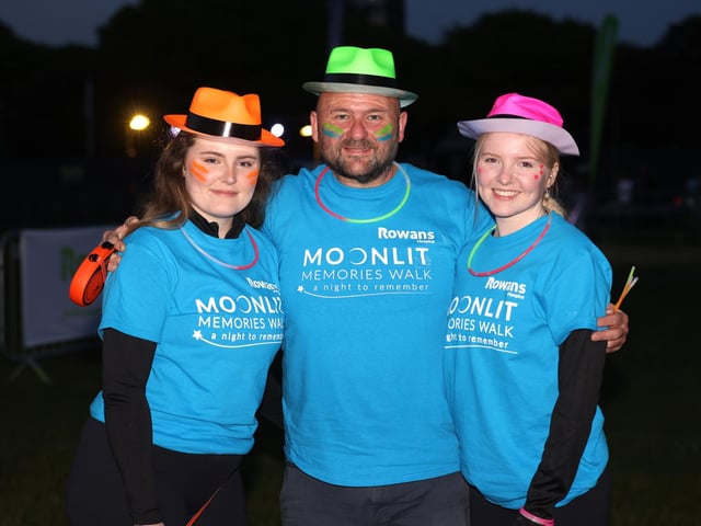 Pictured is (L-R) Sophie Jennings, Adrian Jennings and Aimee Jennings walking in memory of wife and Mum Sue Jennings.