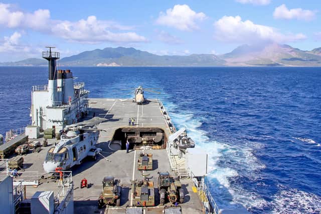 RFA ARGUS sailing away from the coast of Montserrat in the Caribbean.
