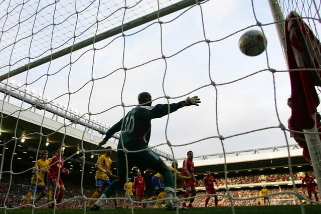Richard Pacquette puts Hawks in front at Anfield in the FA Cup fourth round in January 2008. Photo by Mark Thompson/Getty Images.