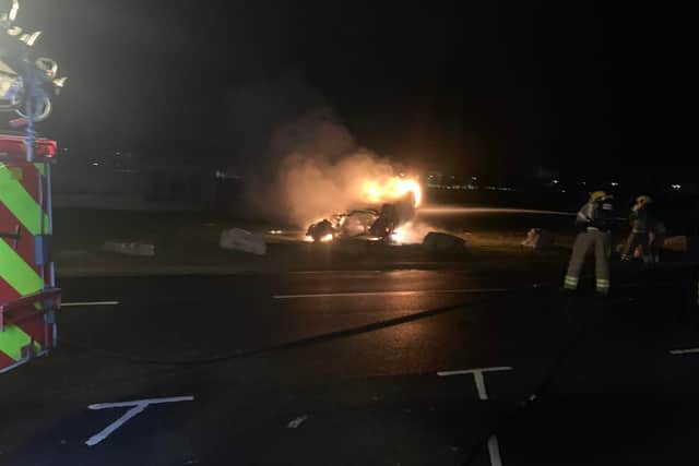 A car 'engulfed in flames' on Southsea Common. Picture: Southsea Fire Station via Twitter