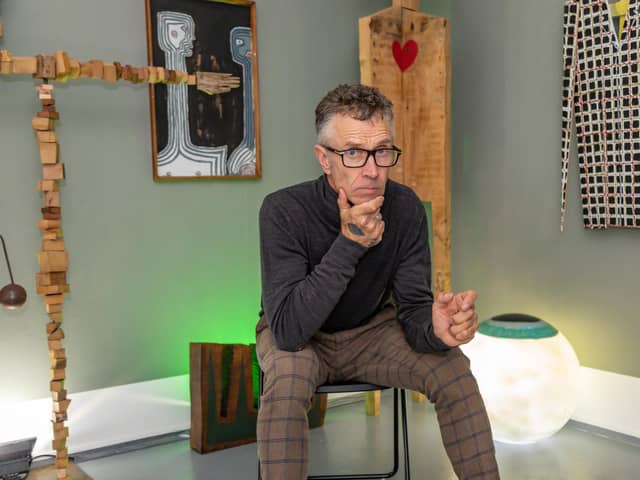 Ian Parmiter in his exhibition at Art Space in Brougham Road. Picture: Mike Cooter (081022)