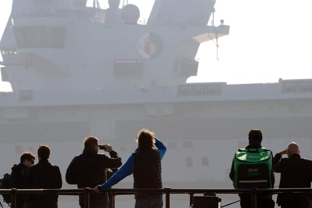 HMS Queen Elizabeth leaving Portsmouth on Monday, March 1.Picture: Sarah Standing (010321-1743)