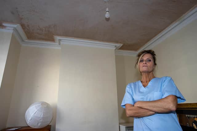 Suzanne Jasicki was left dazed after her living room ceiling came crashing down on her, despite repeated reports to her letting agent Belvoir that it was unsafe. Photos by Alex Shute