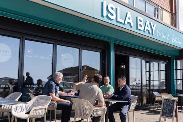 Alan Mak MP talks to Isla Bay owners Emrah Tashan and Eray Karacan