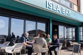 Alan Mak MP talks to Isla Bay owners Emrah Tashan and Eray Karacan