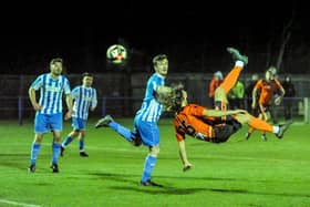 Scott Jones scores an overhead kick as Portchester win 3-0 at Cowes Sports on Tuesday. Picture by Daniel Haswell.