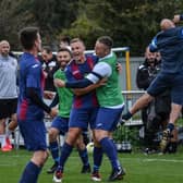 US Portsmouth manager Glenn Turnbull jumps for joy as his players celebrate their FA Vase victory at AFC Portchester. Picture: Daniel Haswell.