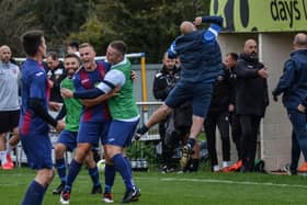US Portsmouth manager Glenn Turnbull jumps for joy as his players celebrate their FA Vase victory at AFC Portchester. Picture: Daniel Haswell.