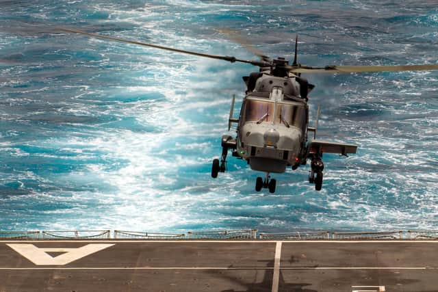 A Wildcat helicopter with a Stingray setup on the weapon wing.