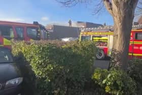 The scene of the fire in Portchester Precinct yesterday afternoon. A man reportedly 'fell from a height' and has to be rushed to hospital.