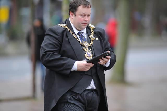 Cllr Lee Mason pictured on his phone near Portsmouth Crown Court in February, 2019.
Picture: Habibur Rahman