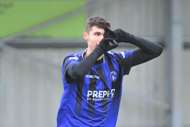Dan Penfold celebrates scoring Clanfield's equaliser against Locks Heath. Picture: Martyn White