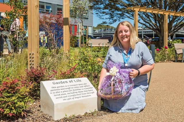 Amy Sheaff, 28, with the prize she received after her suggestion was used to name the Garden of Life at QA Hospital. Picture: Mike Cooter (090621)