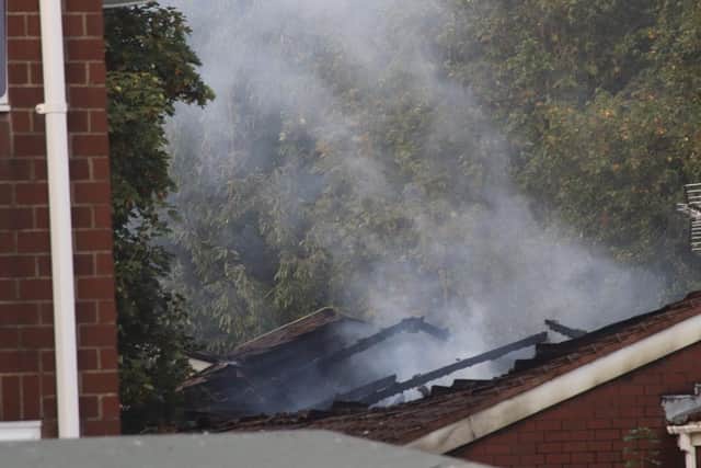 The remains of the bungalow in Aspengrove, Gosport, following a serious fire there this evening. Photo: Habibur Rahman