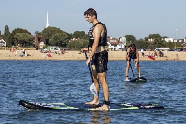 A paddle boarder at Stoked Watersports, Gosport.