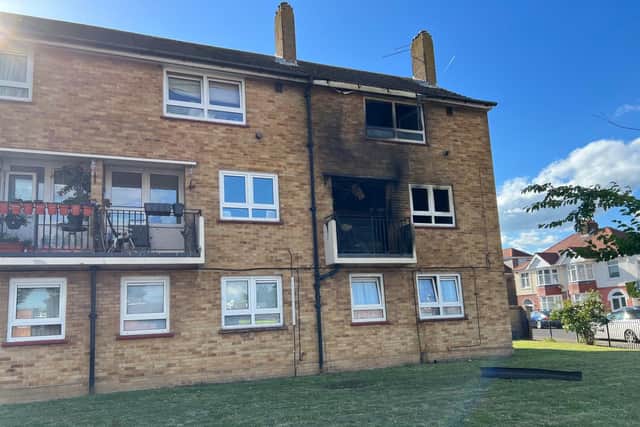 The aftermath of the fire, which has wrecked a two-storey flat inside the apartment block in London Road.