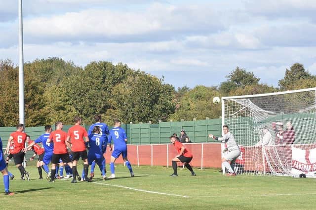 That's another one - Callum Benfield glances in a header for Fareham's second goal in their 8-2 drubbing of Portland. Picture: Paul Proctor.