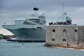 Royal Navy aircraft carrier HMS Queen Elizabeth leaves Portsmouth Harbour for sea trials in UK waters ahead of its carrier strike deployment later in the year.
Ben Mitchell/PA Wire
