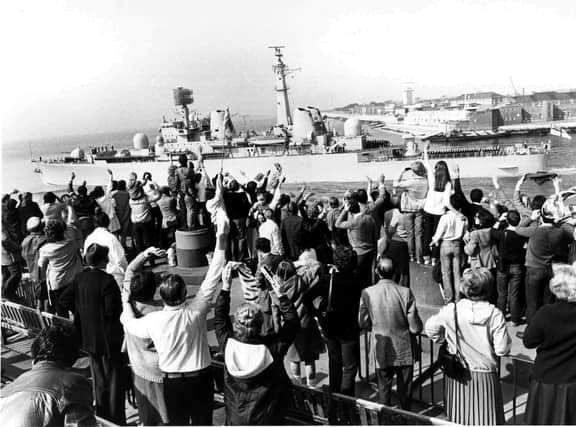 Family and friends wave as HMS Bristol leaves to join the task force in the Falklands, South Atlantic.Picture ref: 821093-3
