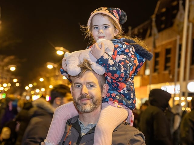 The crowds braved the wind and rain to watch the Christmas lights being switched on in Fareham highstreet on Saturday evening, while some of the entertainment was moved into the shopping centre.Pictured - Avalyn, 4 with DadPhotos by Alex Shute