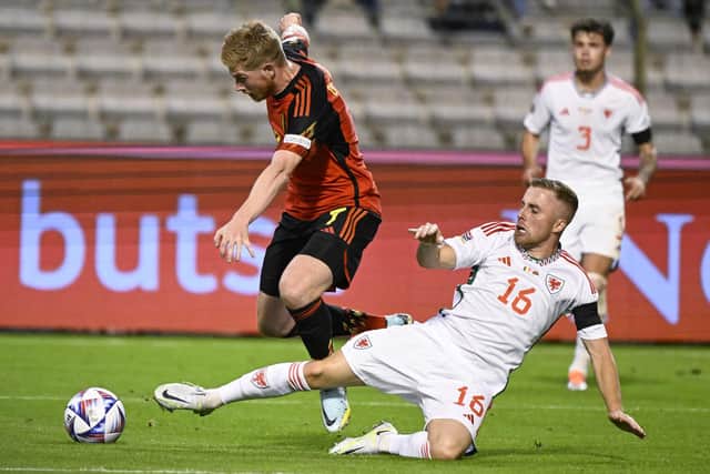Joe Morrell cleanly wins the ball against Kevin De Bruyne. (Photo by LAURIE DIEFFEMBACQ / BELGA MAG / Belga via AFP) (Photo by LAURIE DIEFFEMBACQ/BELGA MAG/AFP via Getty Images)