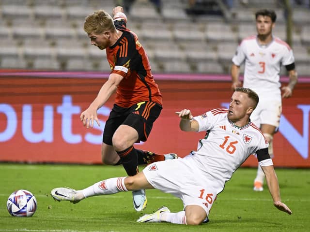 Joe Morrell cleanly wins the ball against Kevin De Bruyne. (Photo by LAURIE DIEFFEMBACQ / BELGA MAG / Belga via AFP) (Photo by LAURIE DIEFFEMBACQ/BELGA MAG/AFP via Getty Images)