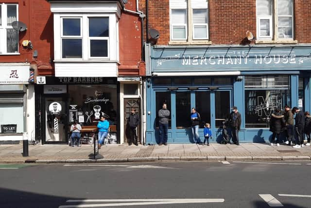 Line outside Top Barbers in Southsea