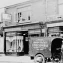 Some very old shops in Cosham High Street, with the lending library on the left.
