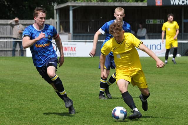 Harvest (yellow) v Hook. Picture by Ian Grainger.
