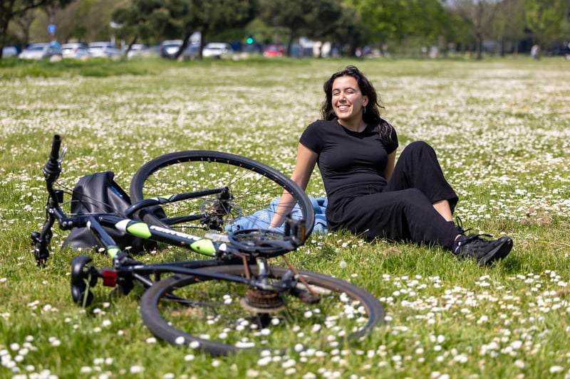 University drama student Mafalda Garcia among the huge spread of daisies on Southsea Common. Picture: Mike Cooter (110524)