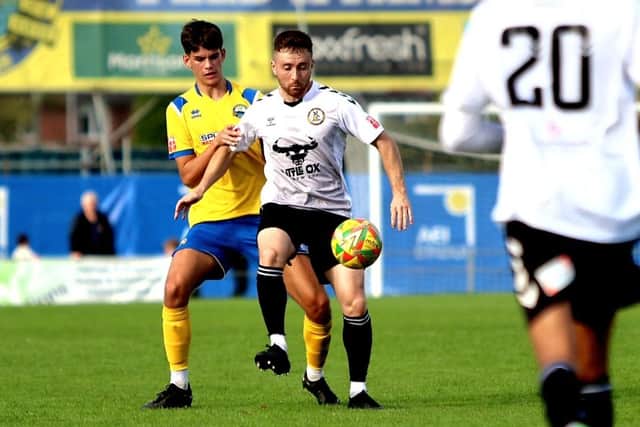 Gosport's Finn Walsh-Smith, left, keeps a close eye on a North Leigh opponent in October. Picture: Tom Phillips