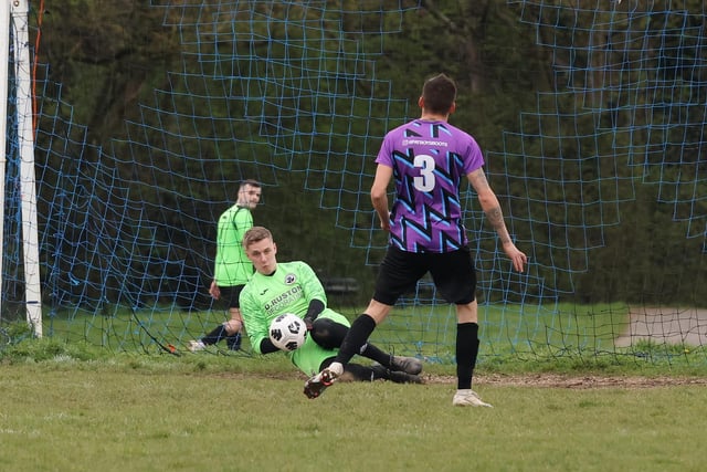 The Emsworth Town reserves goalkeeper saves a penalty during his team's 3-0 loss against Al's Bar in City of Portsmouth Sunday Football League Division Four. Picture: Kevin Shipp