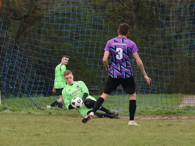 The Emsworth Town reserves goalkeeper saves a penalty during his team's 3-0 loss against Al's Bar in City of Portsmouth Sunday Football League Division Four. Picture: Kevin Shipp