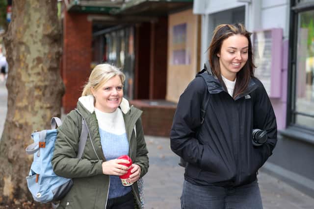 Local members of the community and business owners making the most of the pedestrianised areas in Guildhall Walk. Picture: Alex Shute