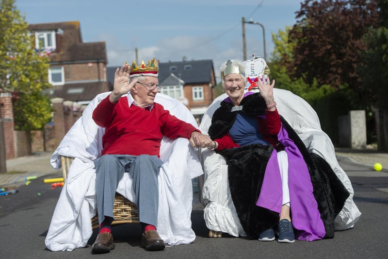 First Avenue residents John Potter and Helen Harbour, both 93, celebrate the Coronation at the street party