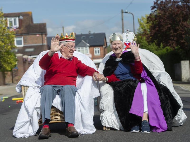 First Avenue residents John Potter and Helen Harbour, both 93, celebrate the Coronation at the street party