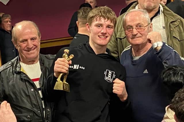 Harry Jones, centre, with Munich 1972 Olympics bronze medallist grandad Ralph Evans, left, along with former British bantamweight title contender great uncle Wayne Evans
