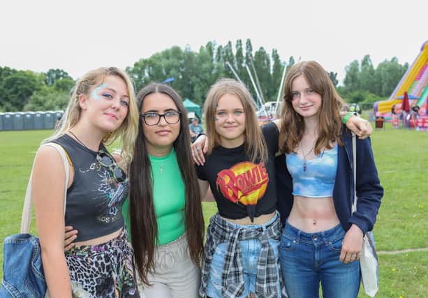 Locals descended on Swanmore College on Saturday afternoon to see a host of local and A List performers, including Tinchy Strider and Martin Kemp. Pictured - Locals Sophia Harding, 15, Anastacia Kolarovska 14, Taya Rogers 15 and Imogen Reynolds 15, enjoying the bands perform. Photos by Alex Shute